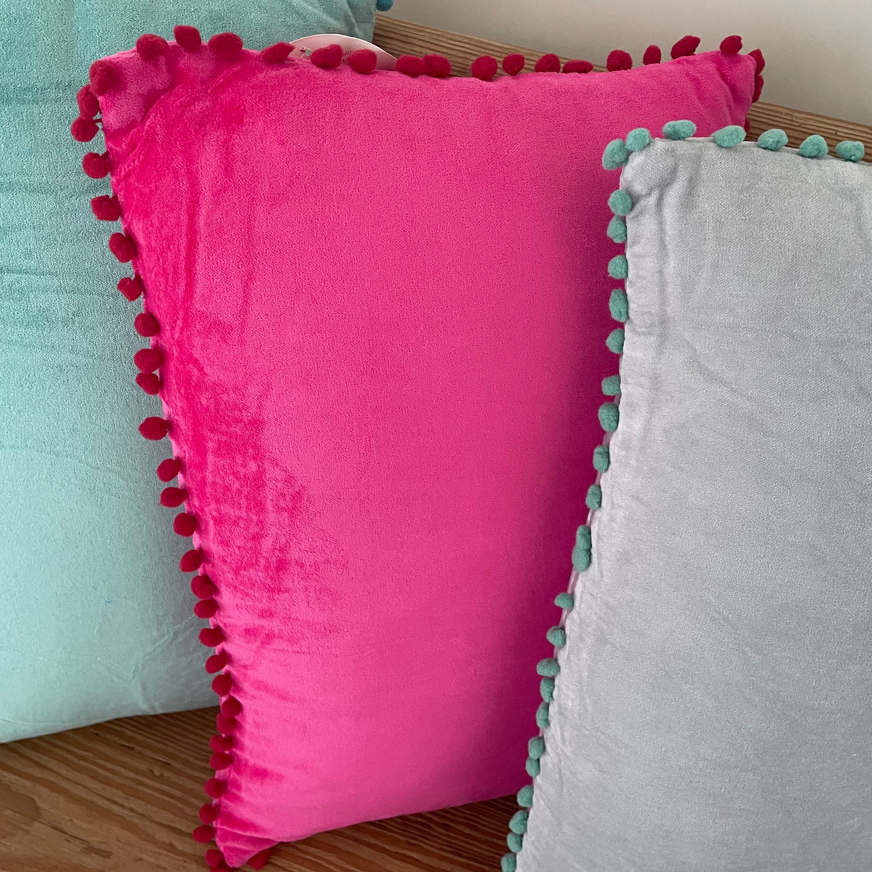 Pink Velvet Pom Pom Cushion.